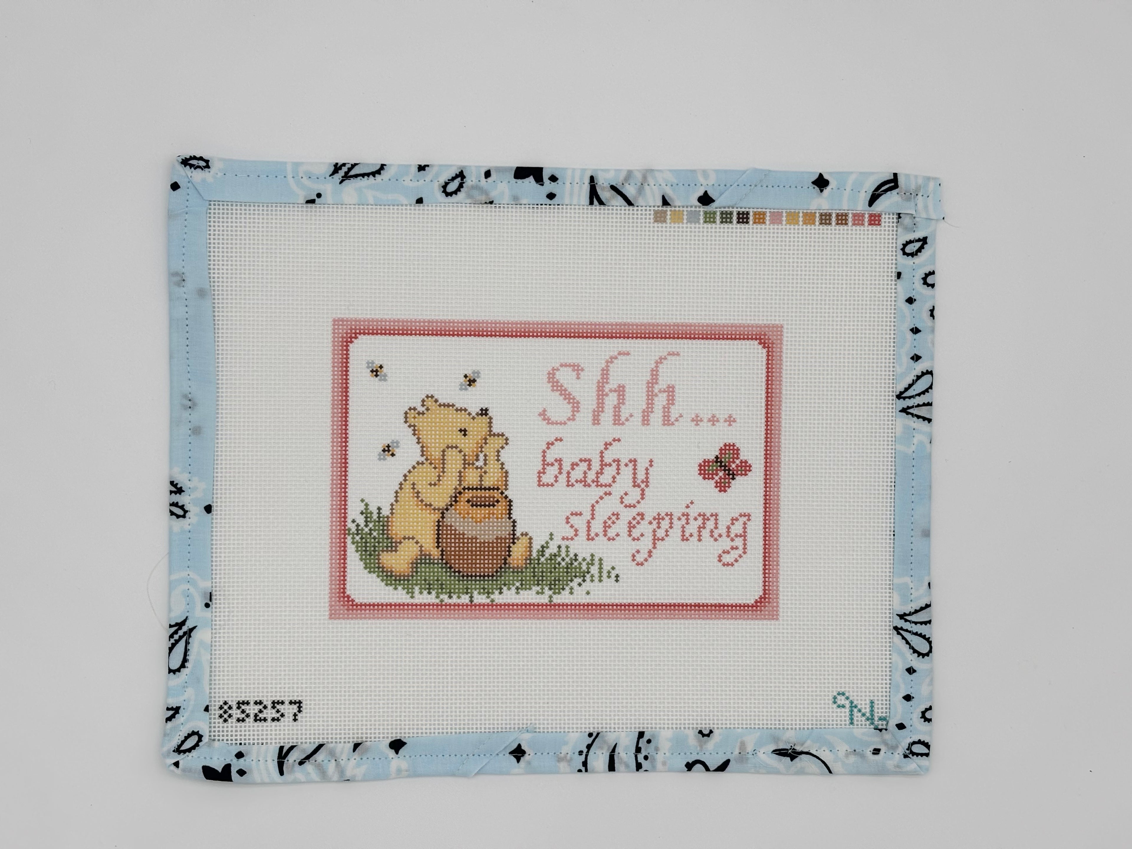 Stitch a sweet honey pot door hanger with this 18 mesh needlepoint canvas by NeedlePaint. 10 x 8" canvas with a 6 x 4" design. Perfect for a nursery.