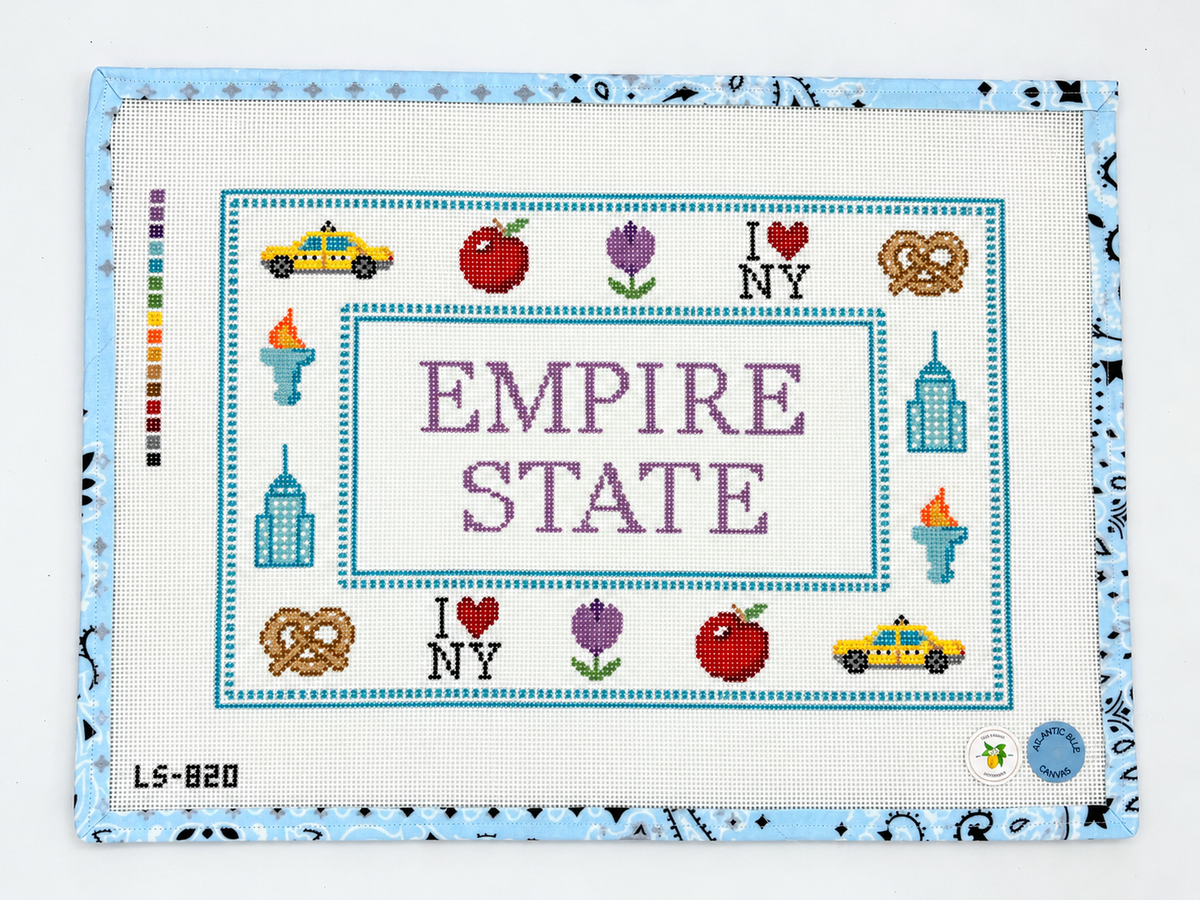 Stitch an iconic skyline with this hand-painted Empire State needlepoint canvas. 13 mesh, 14.5” x 9.3”. Threads not included.