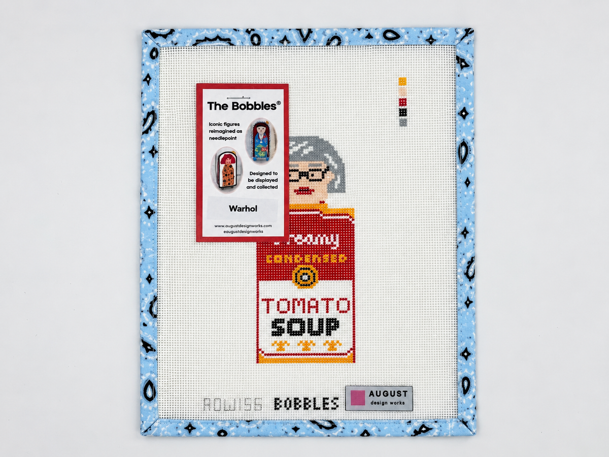 Stitch the Andy Warhol Campbell Soup Bobble by August Design Works. Hand-painted 18-mesh needlepoint canvas with a 2 x 5-inch design. Threads sold separately.