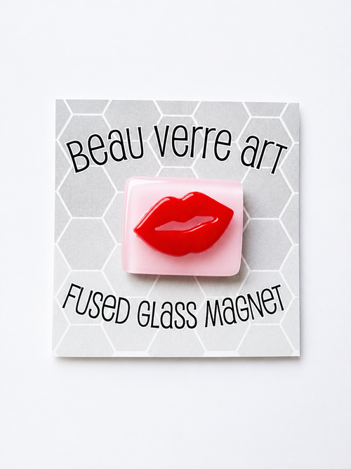 Shop the Beau Verre Lips Needleminder — handcrafted glass art with strong magnetic hold. A chic gift or accessory for needlepoint enthusiasts. Each piece unique.