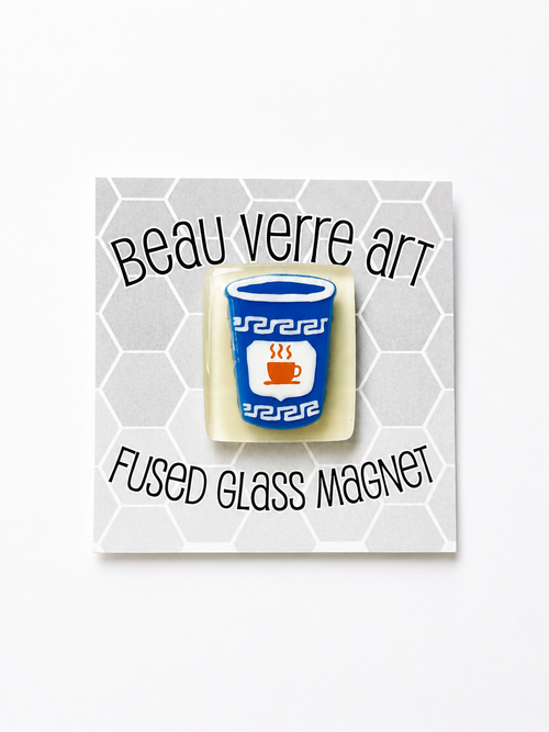 Shop the Beau Verre New York Coffee Cup Needleminder — iconic handcrafted glass art with strong magnetic hold. A perfect gift for needlepoint lovers.