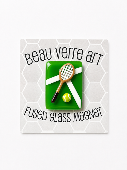 Shop the Beau Verre Tennis Needleminder — handcrafted glass art with strong magnetic hold. A fun gift for tennis lovers and needlepoint enthusiasts. Each piece unique.