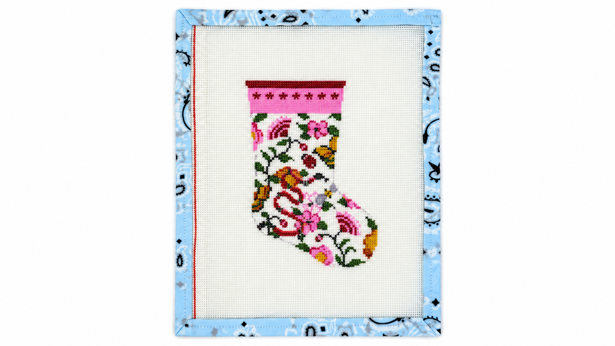 Shop Gucci Garden Mini Stocking by C'ate La Vie, a 4.5" x 6" needlepoint canvas on 18 mesh. Unstitched canvas; threads not included.
