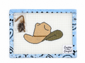 Stitch Curious Cowgirl's hand-painted Cowboy Hat needlepoint canvas, 4 x 6 inches on 18 mesh. Feather and leather cord included; threads not included.