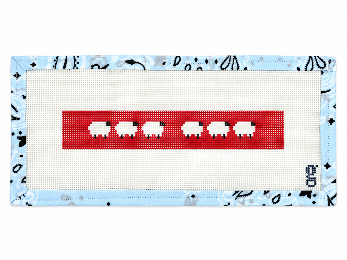 Stitch Goodpoint’s Red Sheep key fob on 13 mesh canvas. 8.4 x 1.4-inch design with bound edges and a Bohin tapestry needle. Threads sold separately.