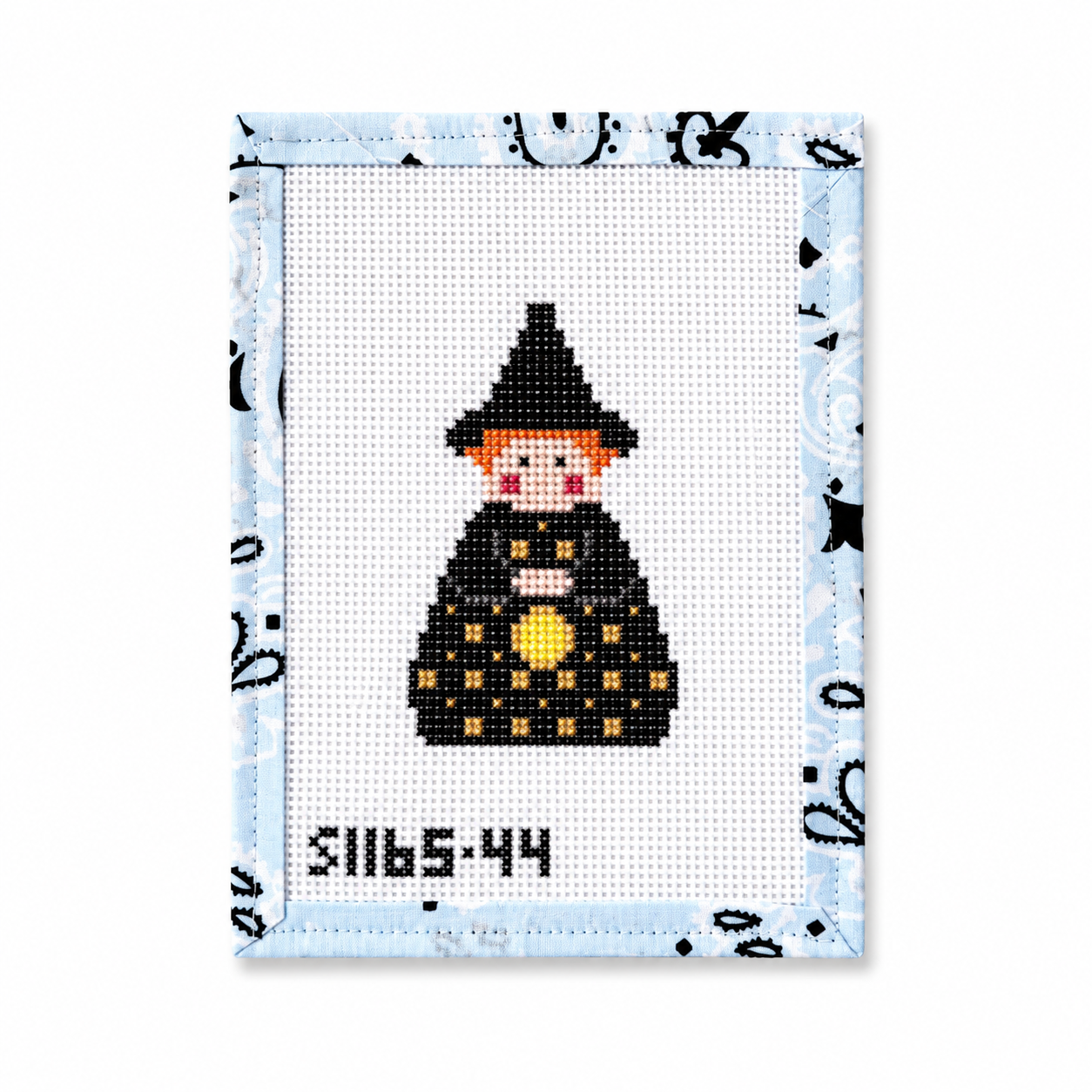Hand-painted Black Witch needlepoint canvas by KCN Designers. 13 mesh, 2.25 x 3". Threads not included. Shop premium Halloween canvases.