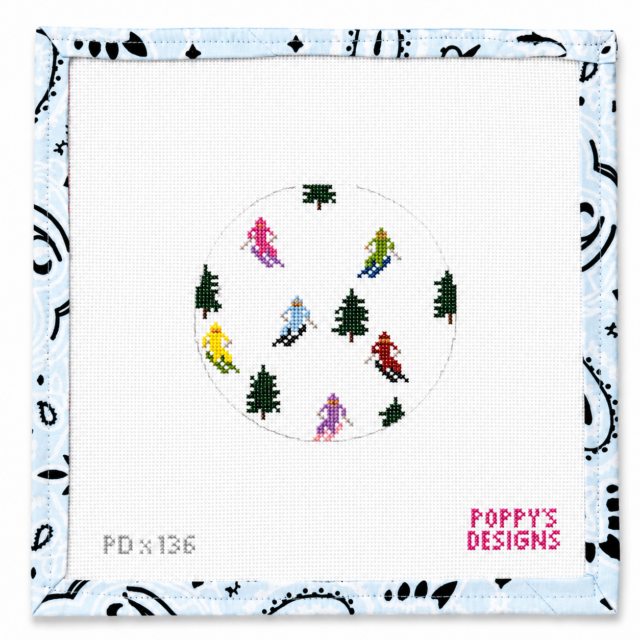 Hand-painted Skier Round needlepoint canvas by Poppy Designs. 18 mesh, 4x4" design. Threads not included. Shop premium winter canvases.