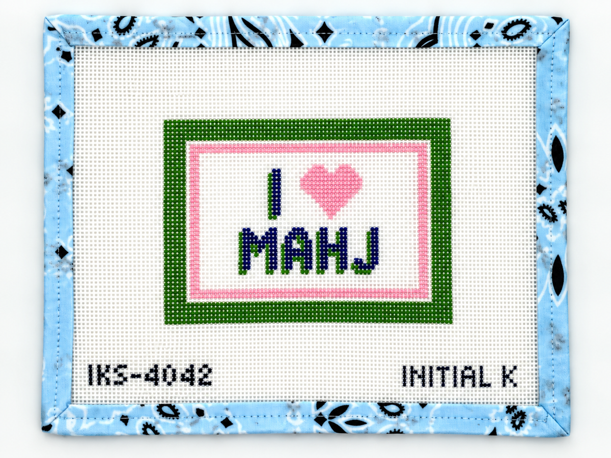 Stitch the I Heart Mahj needlepoint canvas by Initial K. This stitch-painted 5.5 x 4-inch design is on 13-mesh canvas; threads are not included.