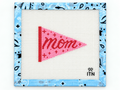 Stitch a Mom pennant needlepoint canvas by Ivy Thread. The 3.3 x 2.5-inch design is ideal for finishing as a charm, patch, or ornament.