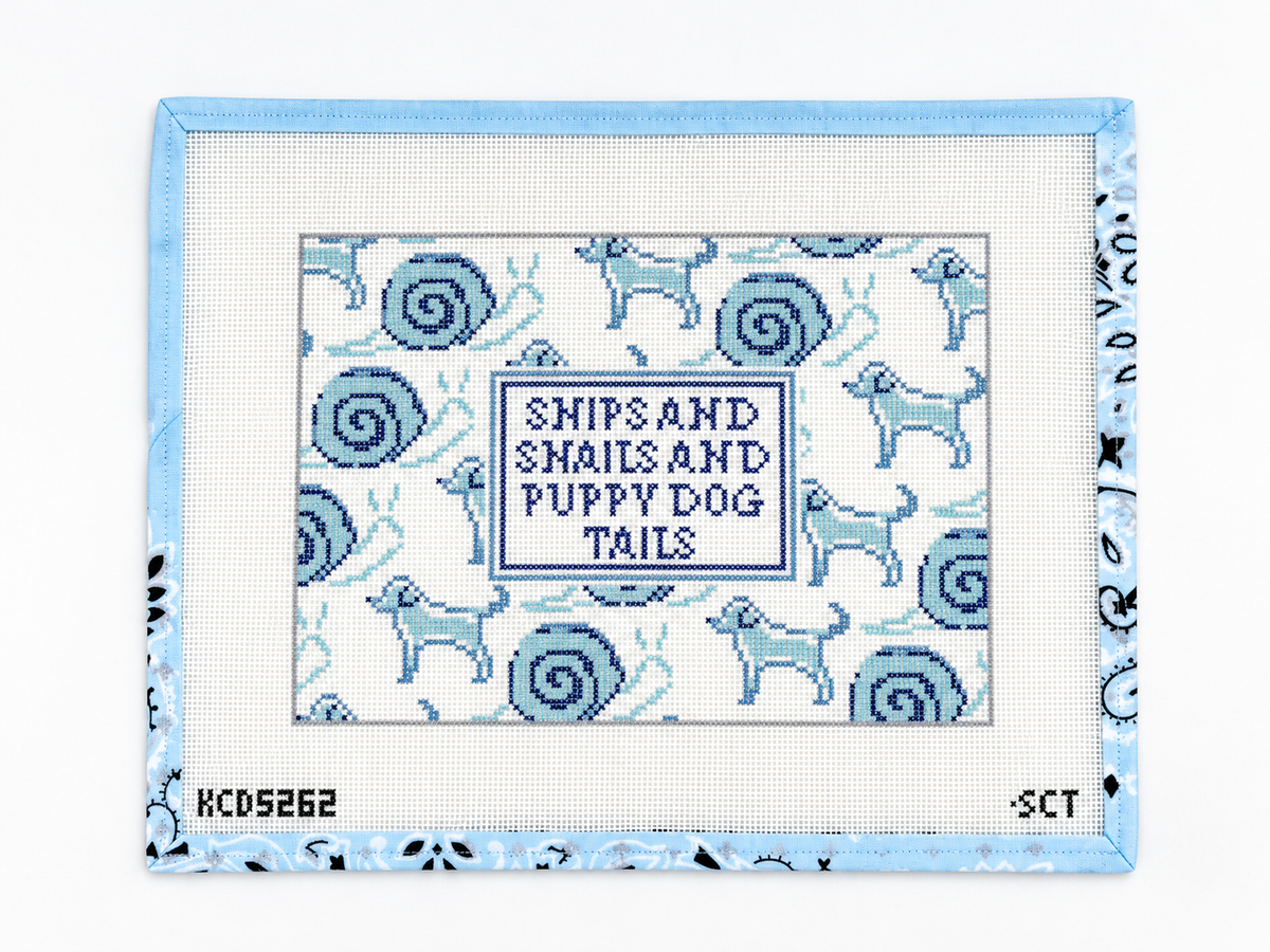 This SCT Designs Snips and Snails and Puppy Dog Tails needlepoint canvas is 10” x 7” on 13 mesh (14¼” x 11¼” overall). Threads not included.