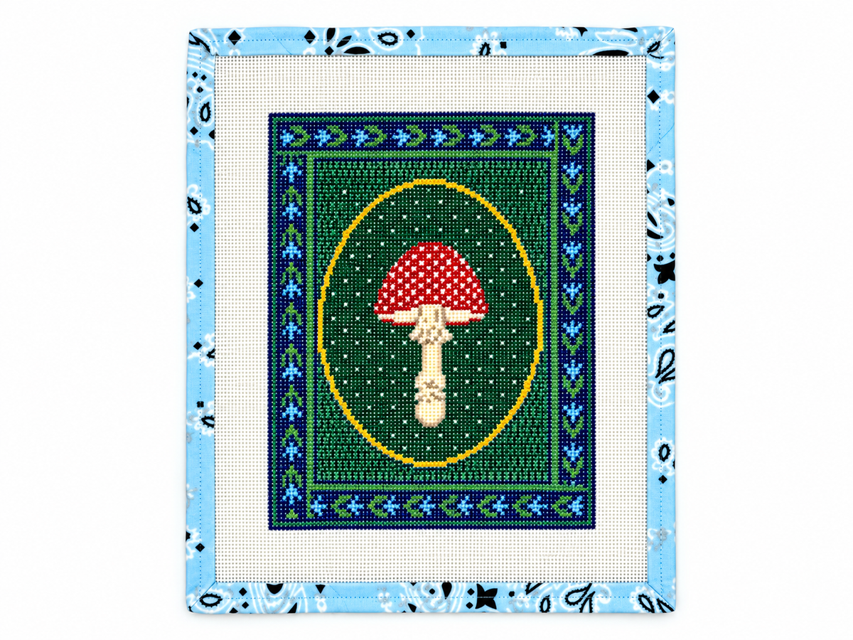 Mushroom stand up needlepoint canvas by KCN Designers on 13 mesh, 12" x 14" canvas with an 8" x 10" design. Threads sold separately.