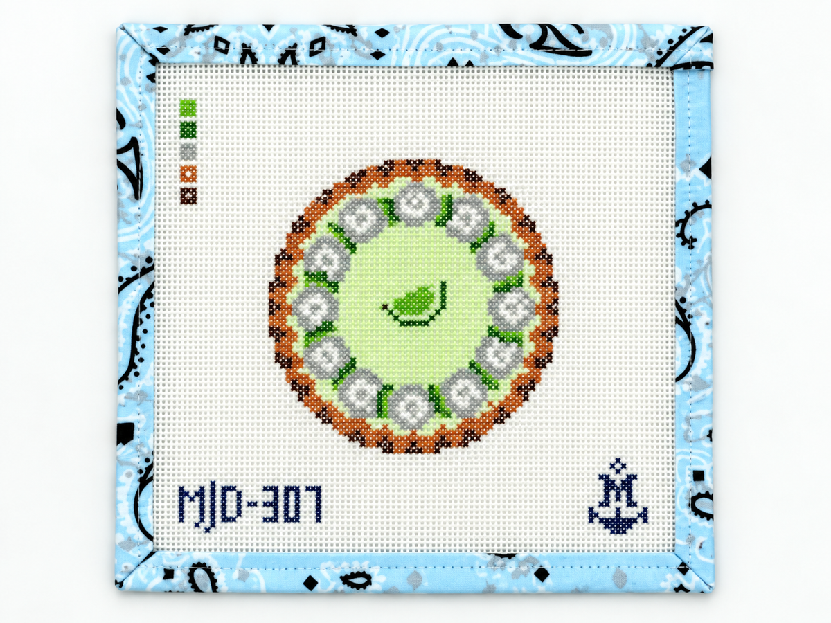 Stitch a Key Lime Pie needlepoint canvas by Morgan Julia Designs. This 4-inch round design is on 13-mesh canvas; threads are not included.