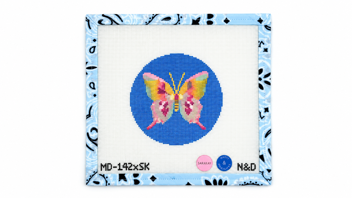 Shop Blue Butterfly by Nash & Daughters: a 4-inch round, stitch-printed needlepoint canvas on 18 mesh with a digital stitch guide. Threads not included.