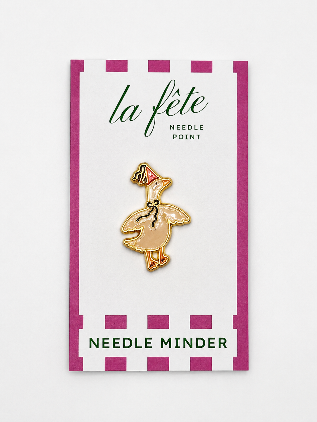 Keep your needle close with the adorable Party Goose Needle Minder, designed to accompany La Fete Party Animal needlepoint canvases. A charming and practical stitching accessory.