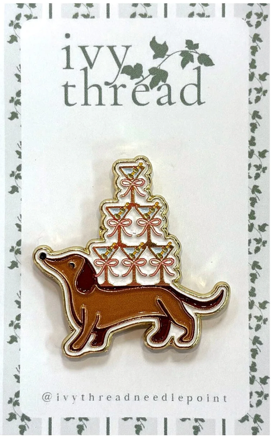 Keep your needle handy with this fun Weenies & Tinis magnetic needleminder by Ivy Thread Needlepoint. 1.5 x 1.5". A cute accessory for any project.